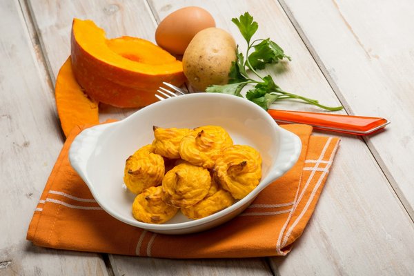 Quel est le secret pour des pommes de terre duchesse parfaitement dorées et moelleuses à l'intérieur?